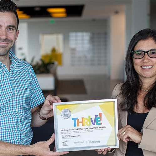 Evan Gatseos of Denver South EDP presents Western Union with the Thrive Award for Employer transportation solutions