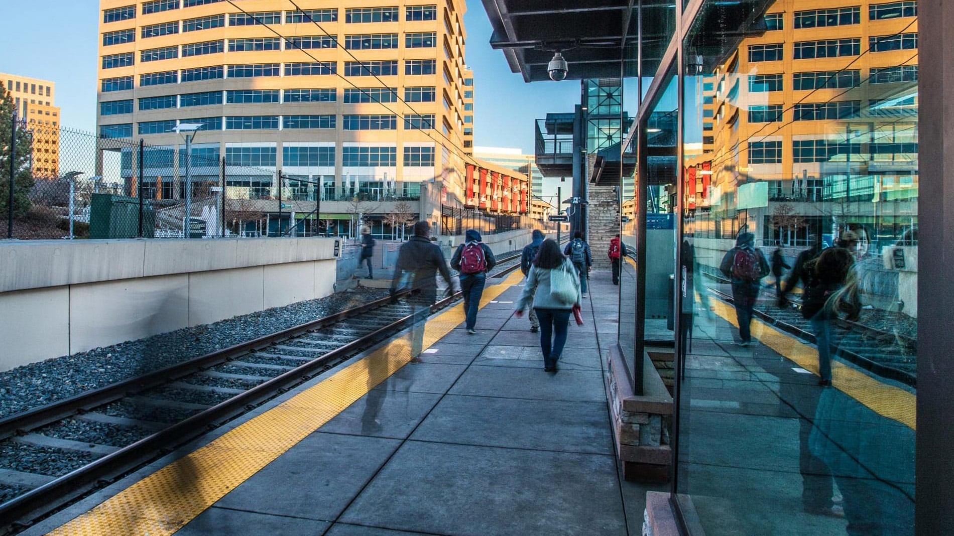 Photo of People Walking at Lightrail Station