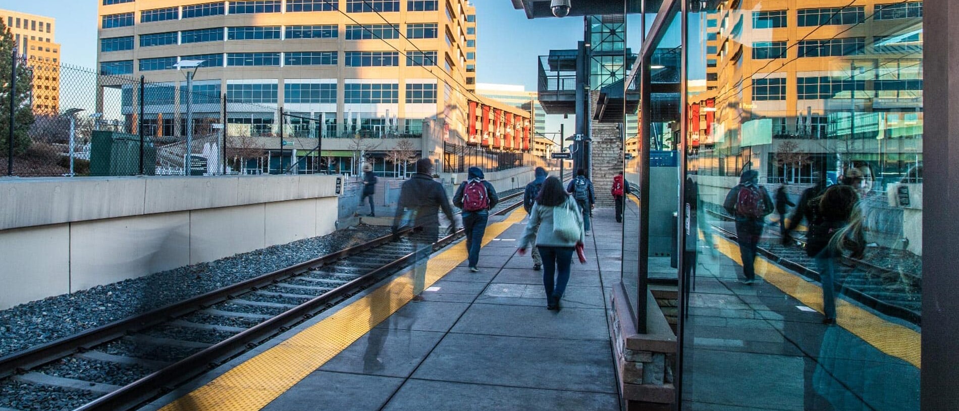 Photo of People Walking at Lightrail Station