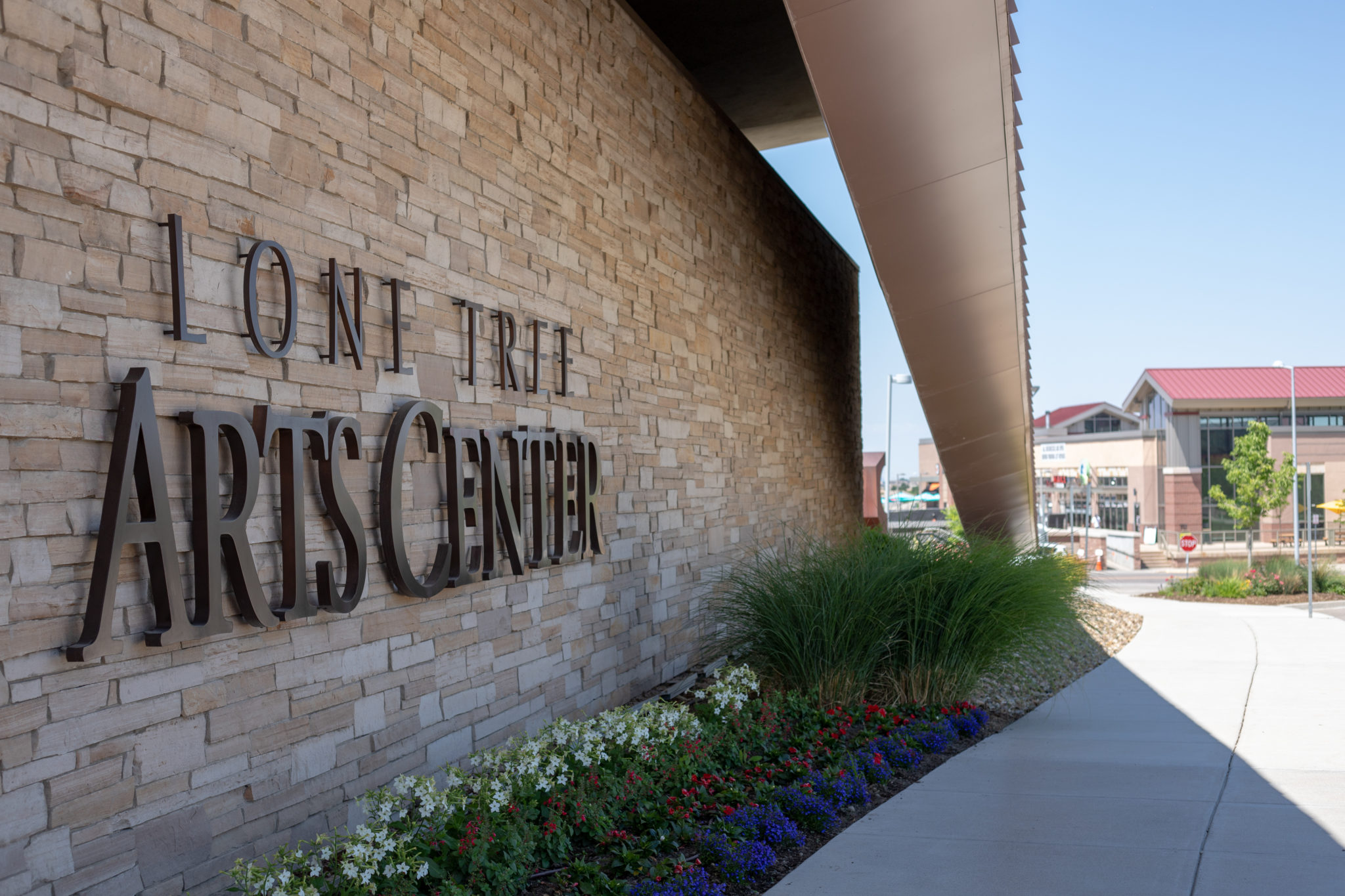 Lone Tree Arts Center Celebrates 10 Years Of Performing Arts   Signage Artscenter Lonetree Corridor 2048x1365 